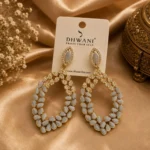 Dhwani Frost Your Self Gold-Plated Grey Stone Chandelier Earrings.