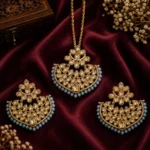 Gold-Plated Traditional Kundan and Pastel Grey Beaded Chandbali Earring and Maang Tikka Set